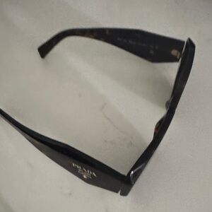 Prada Black Women's Sunglasses with Gold Logo Accent